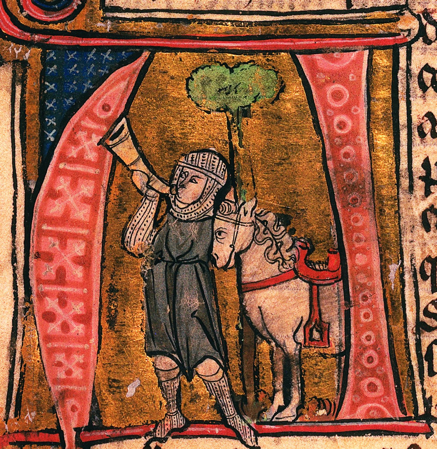 Roland sonne du cor auprès de son cheval blessé.